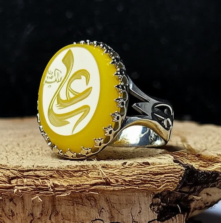 انگشتر نقره با سنگ عقیق زرد شرف الشمس با حکاکی علی کد 1310